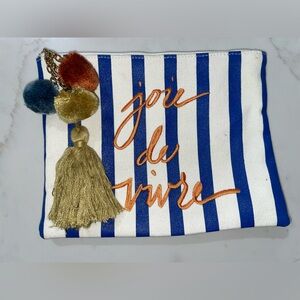 Ann Taylor cosmetic storage bag with tassel